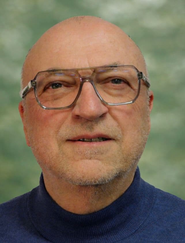 Portrait de Henri Billard en situation professionnelle, souriant et confiant