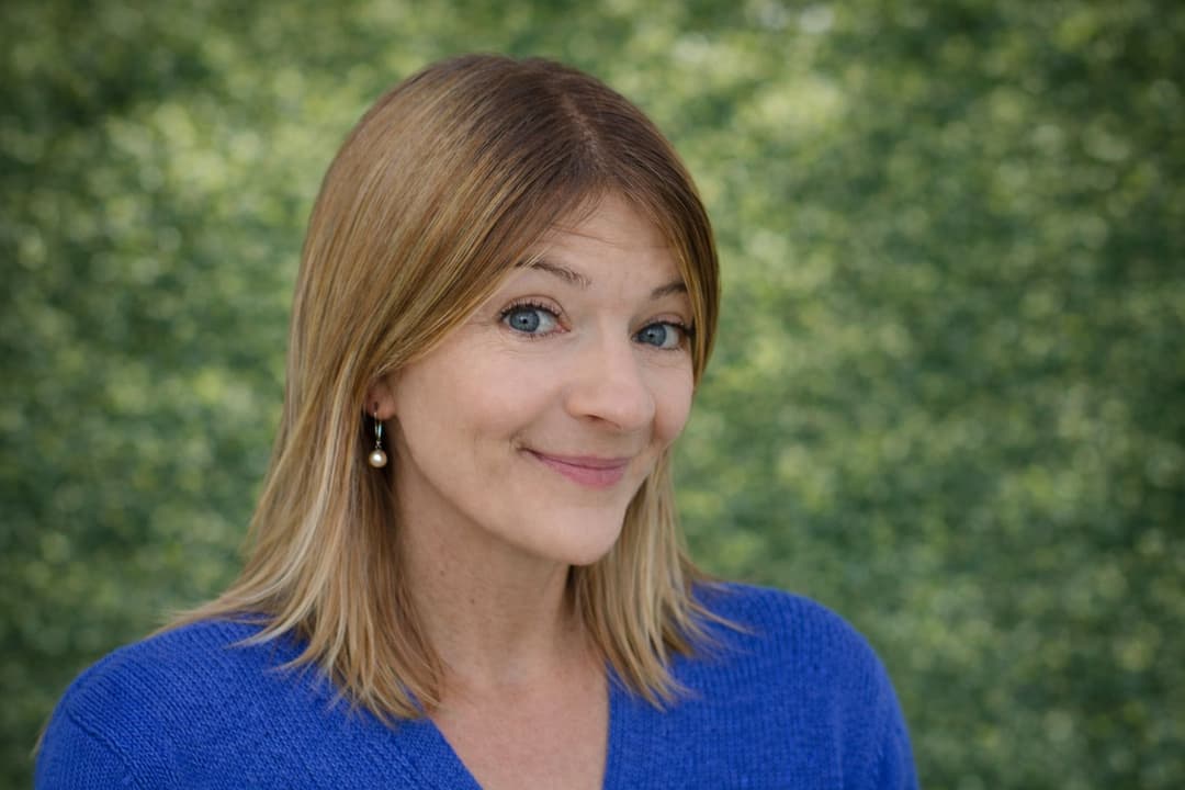 Portrait de Marilyne Da Silva (dite Mary) en situation professionnelle, souriant et confiant