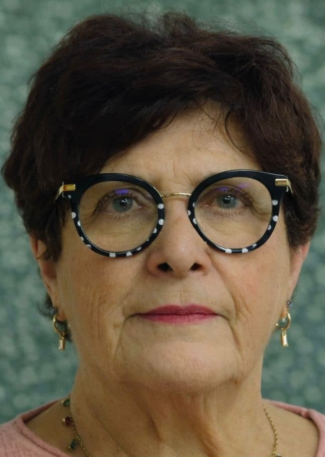 Portrait de Nicole Bergamini en situation professionnelle, souriant et confiant